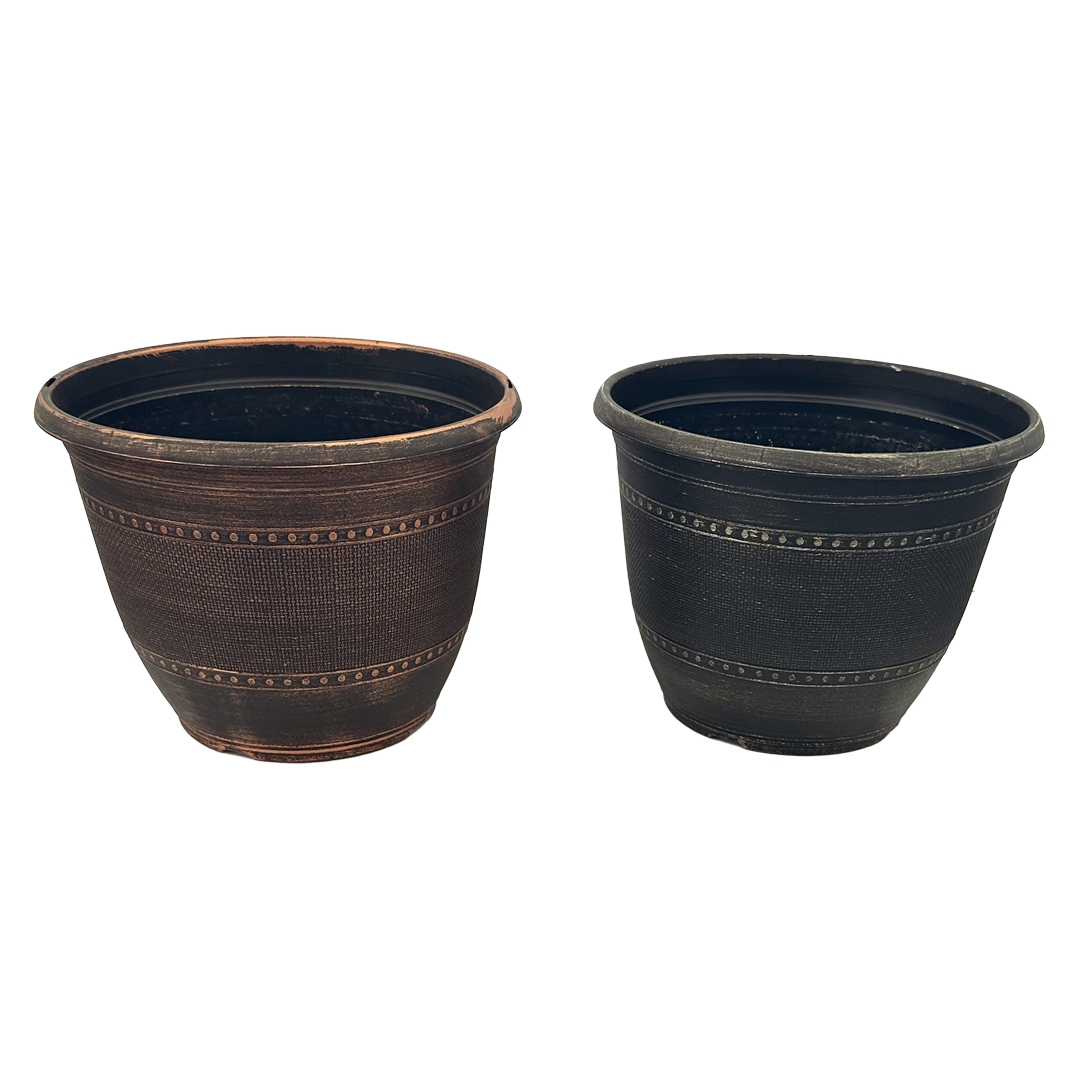 Two black pots, one is copper brushed while the other is Champaign brushed 