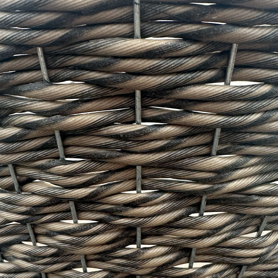 Closeup of hanging basket with a mix of tan and dark brown resin intertwined