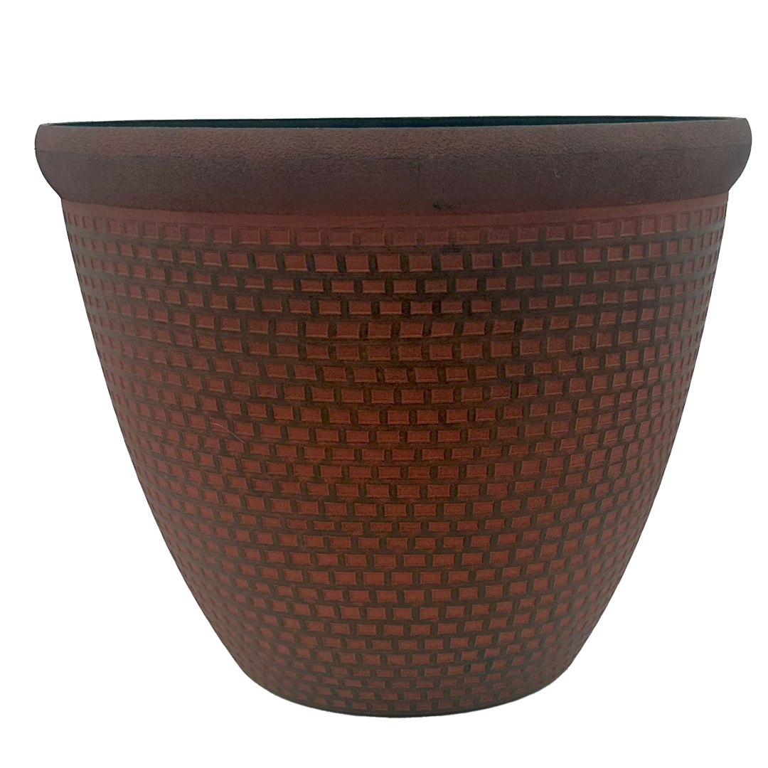 Terra-cotta colored plastic pot with black paint brushed 