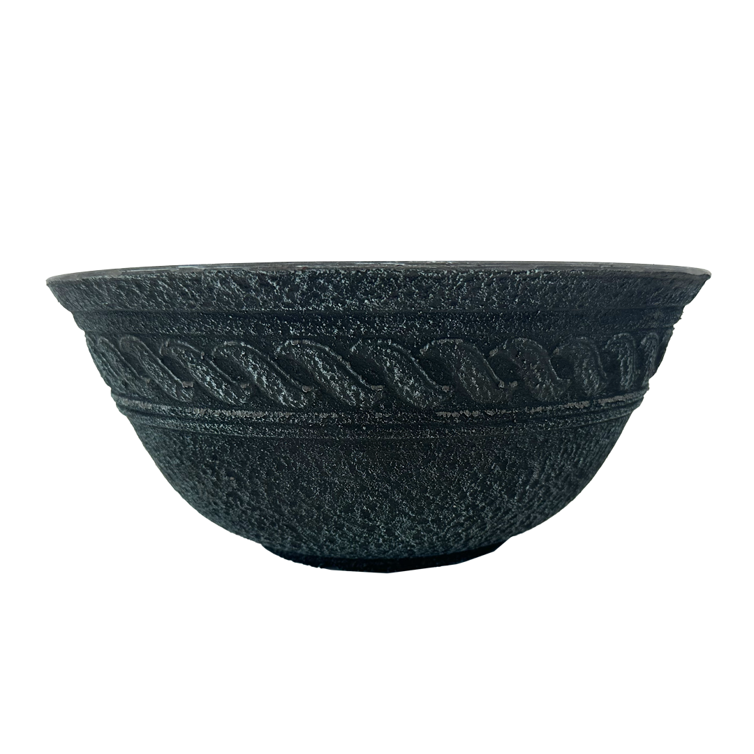 Verdigris bowl planter with raised wave pattern and textured pot