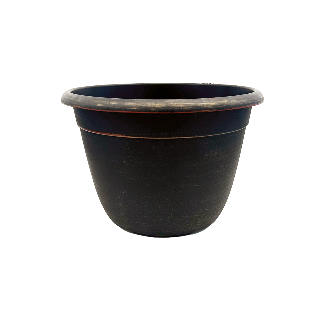 Black pot brushed with copper paint