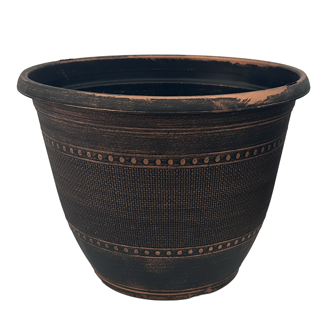 Black pot with brushed warm copper paint. Top is a solid with a circle pattern then a basket weave in between another circle band with a solid bottom