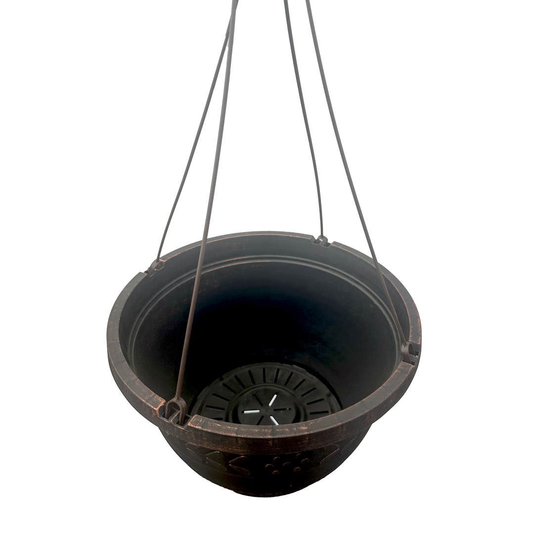 Inside of brushed copper hanging basket with drainage holes 