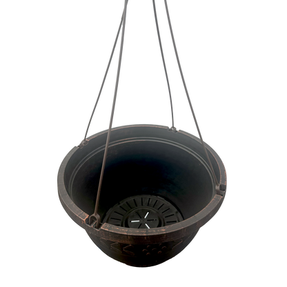 Inside of brushed copper hanging basket with drainage holes 