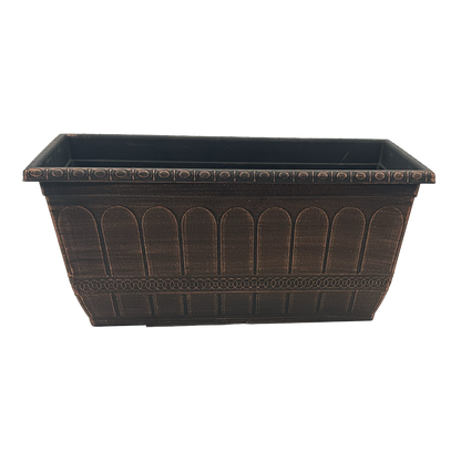 Black Rectangular deck/window box that is brushed with copper paint with a scalloped pattern and interlocking circles band