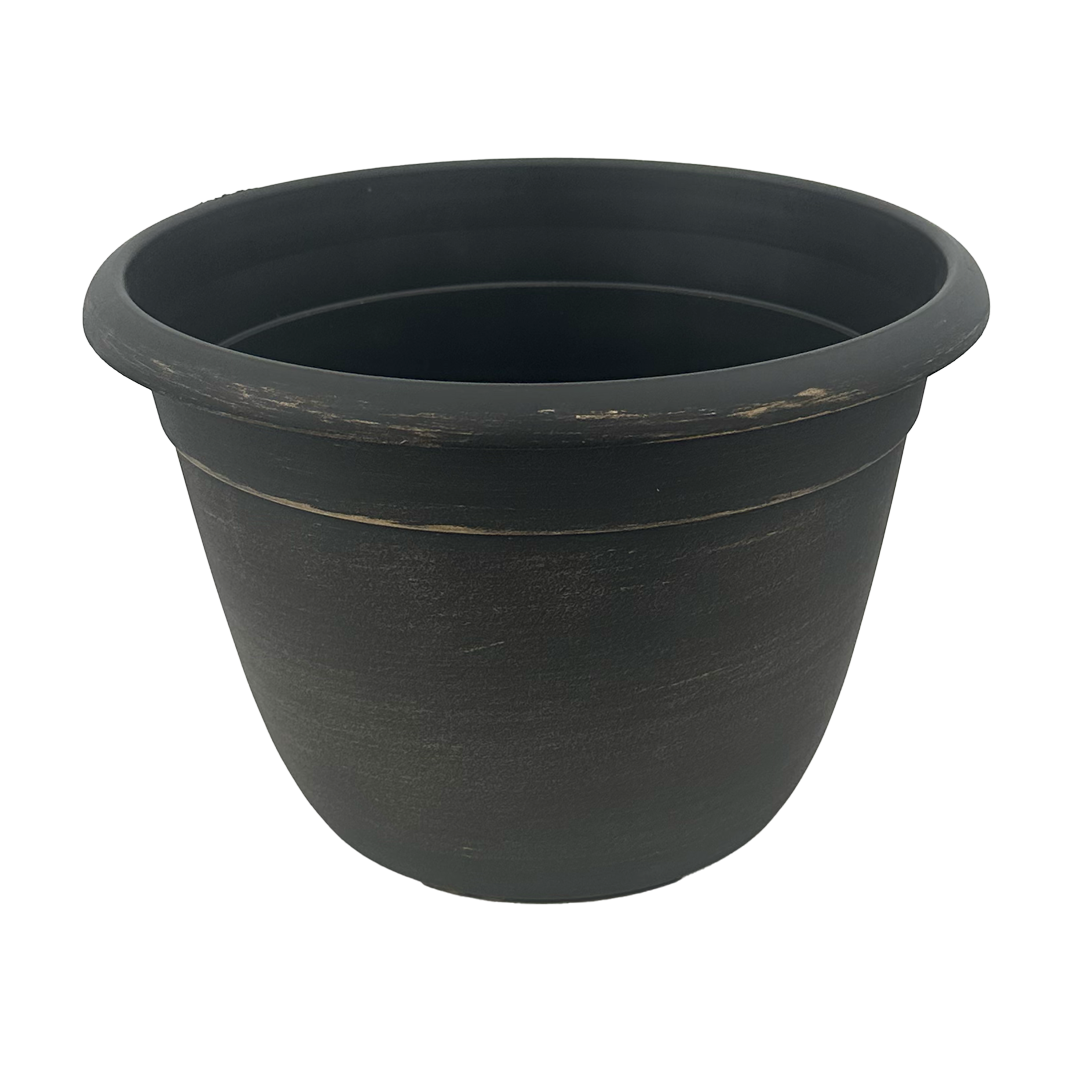 Black pot brushed with gold paint