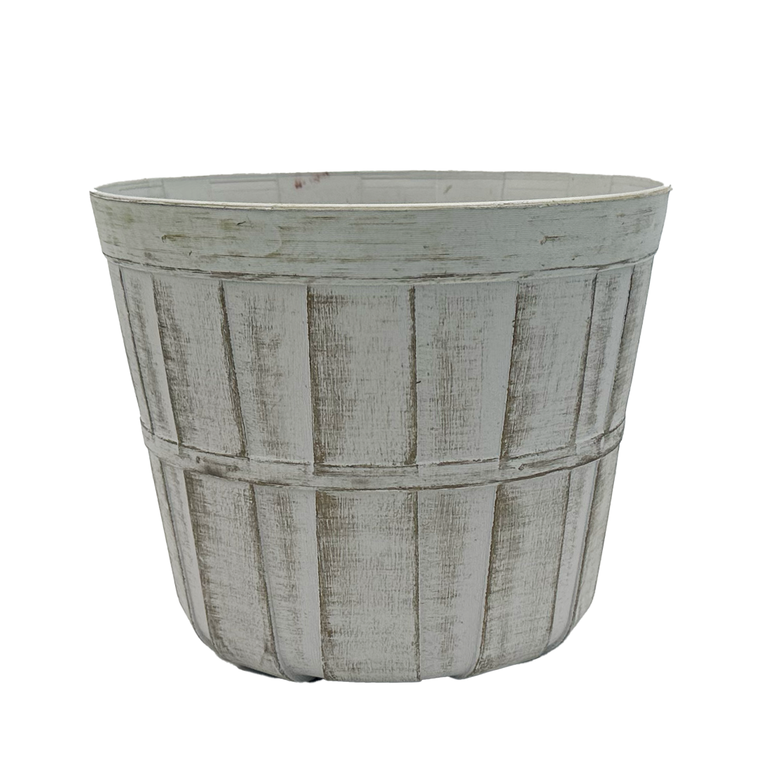 Plastic white distressed planter made to look like a bushel basket 