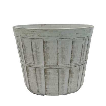 Plastic white distressed planter made to look like a bushel basket 