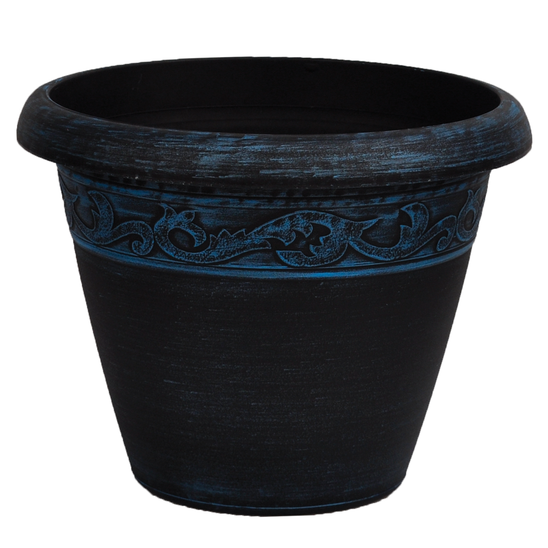 Black pot with brushed blue paint and ornate band towards top of pot