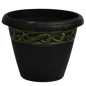 Black pot with brushed green paint and ornate band towards top of pot